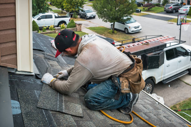 Professional Hail Damage Roof Repair technician working in Clinton, WA